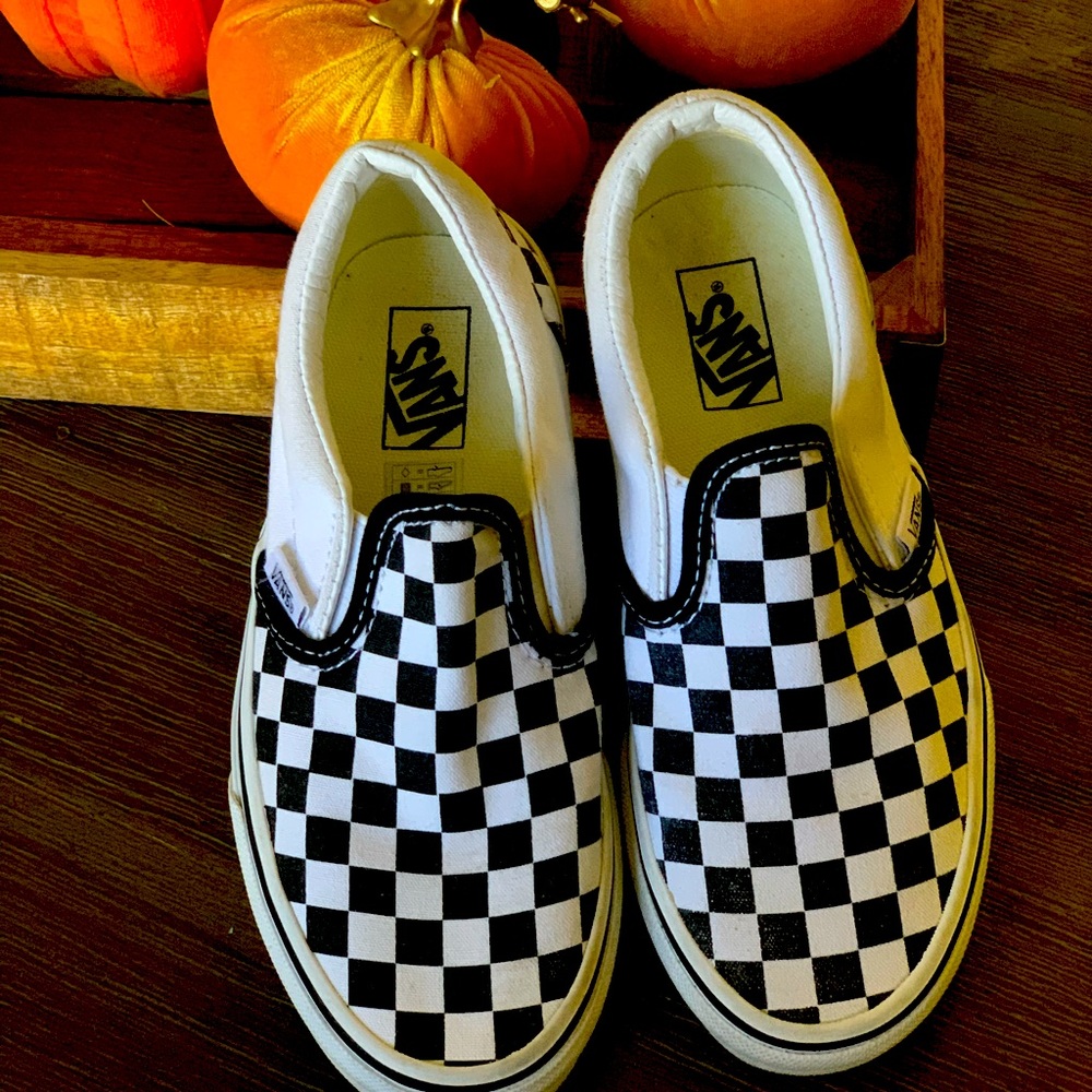 Gently used. Kids Checkered slip on Vans. US Size 2.0 kids.
